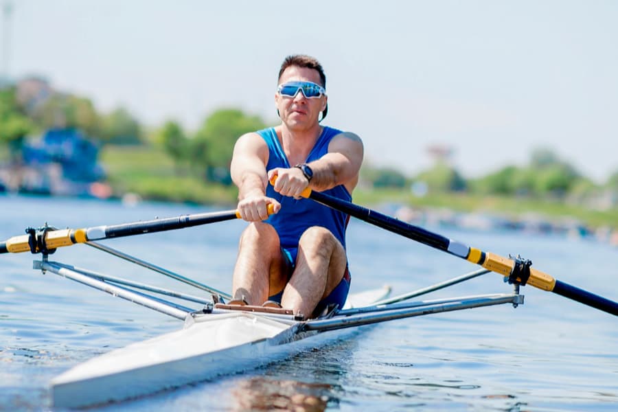 Person rowing on a body of water | Humphrey Shoulder Clinic